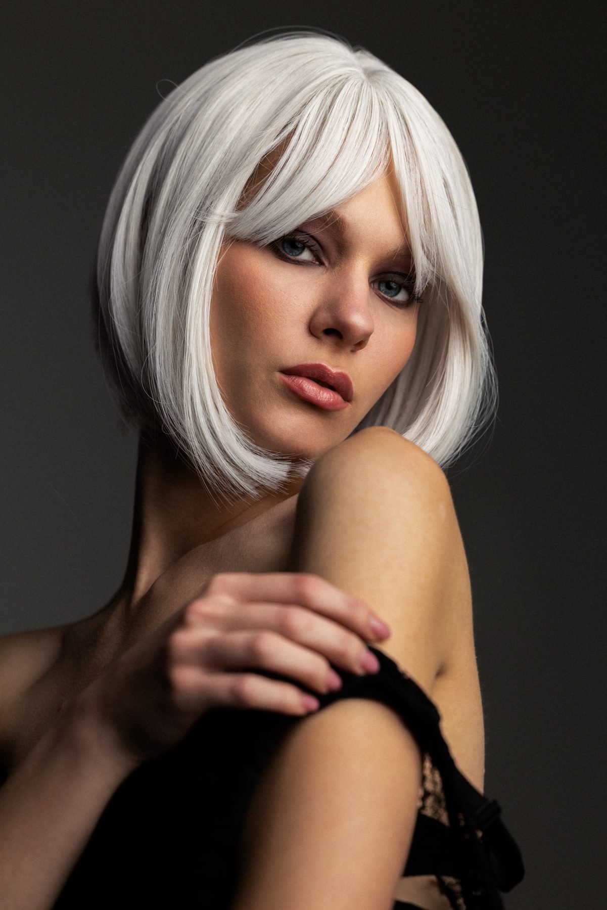 Beauty portrait against a dark studio backdrop